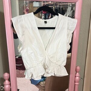 Fancyinn Ivory Ruffle Cropped Sleeveless Blouse